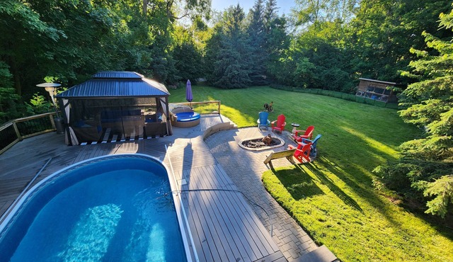Cozy 2 bedroom basement with pool, jacuzzi, gym & sauna. Come see the chickens