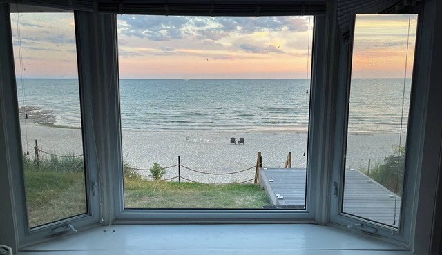 Direct beachfront home with stairs to private beach!