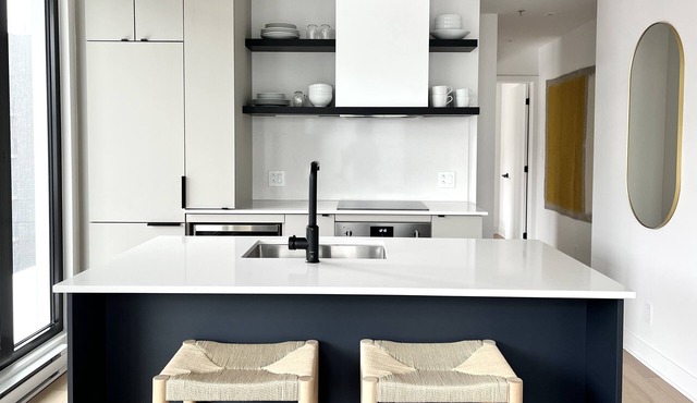 French-scandi canal living: EV/bike parking, gym, pools, rooftop, $133 USD/night