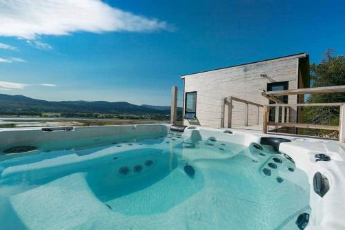 Hôtel à la maison - Panache, spa et fleuve