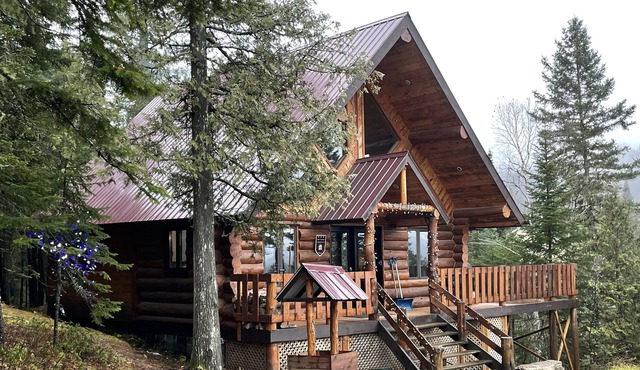 Log cabin in forest in Saint-michel-des-saints