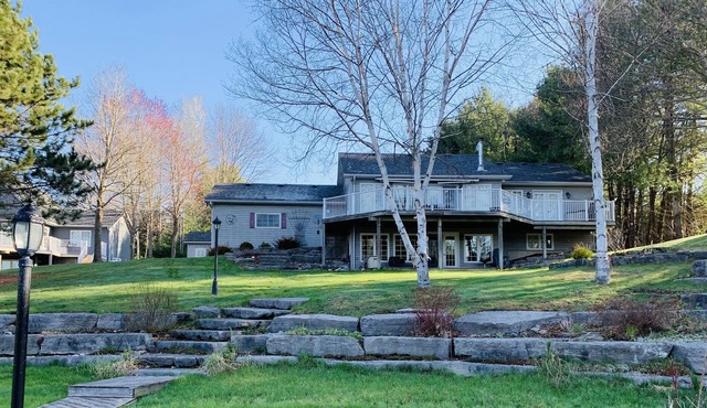 Luxury four-season cottage with sauna, private water access, boat dock