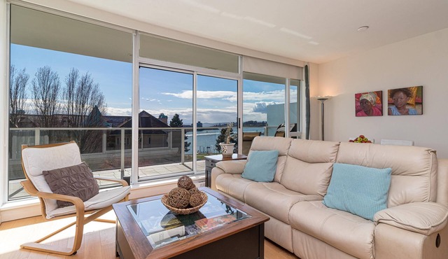 Luxury Waterfront Gem with Panoramic Bay Views