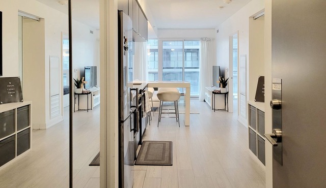 Modern 1+1 Bedroom Condo Steps Away from Vibrant Dundas Square