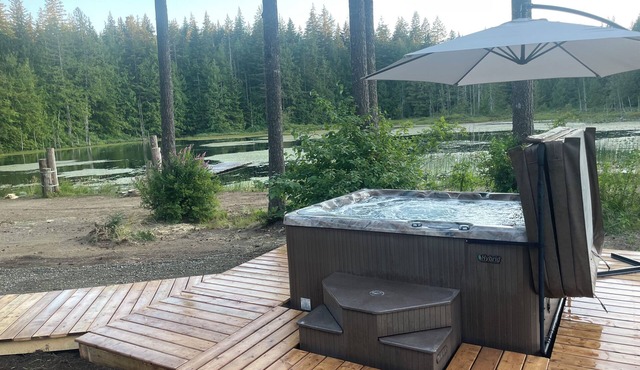 Mountain retreat on a private lake with a hot tub and more!