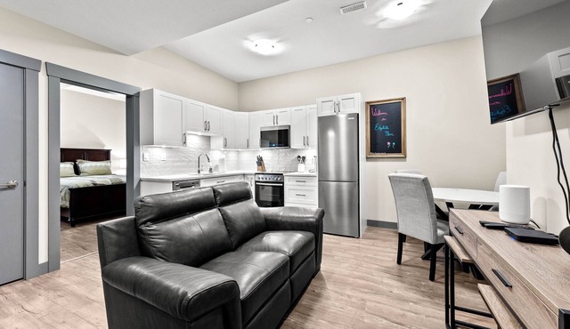"Luxury Redefined: Modern Suite with Hillside Serenity and Central location."