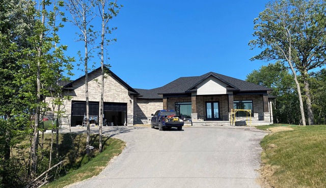 North Muskoka Lake Front 5 Bdrm Newly Built Cottage luxurious Modern Amenities.