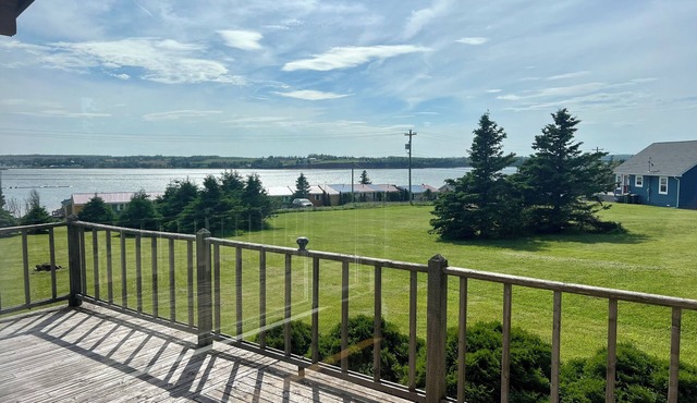 Ocean view cottage with a perfect wrap around deck to watch beautiful sunsets.