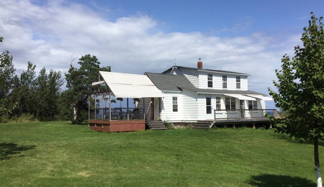 Oceanfront farmhouse retreat