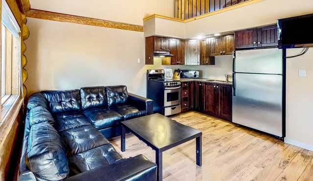 Scenic lakefront resort cabin with deck, full kitchen, & free internet