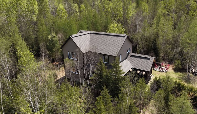 Spacious, secluded chalet in the center of everything. Skiing, snowmobiling, hiking, beach.