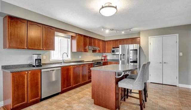 Spacious 4BR | Private Backyard | Prime Location In Waterloo