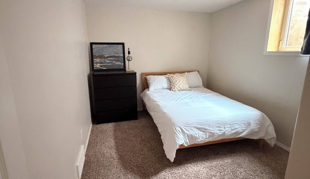 Spacious 5-bedroom home in South Lethbridge. Sleeps 12