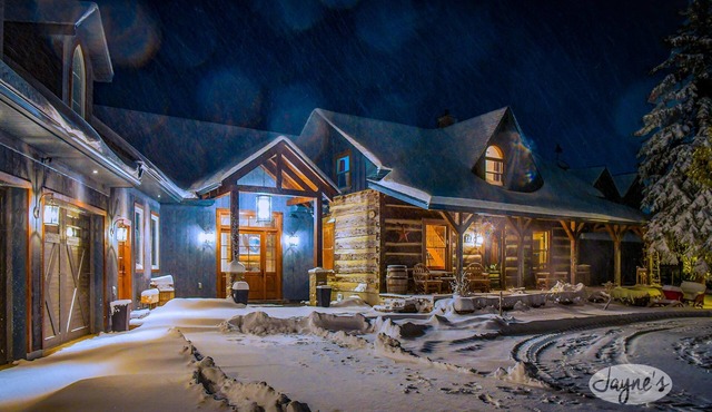 Stunning 6+ bdrm, 4 bath log cabin with spectacular large addition.