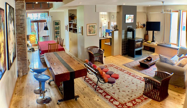 Sun-filled designer home with private garden and garage near Old Montreal