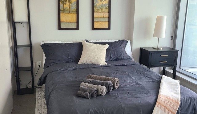 Walk to marketplace from secure condo backing onto Sparks St. (parking spot!)