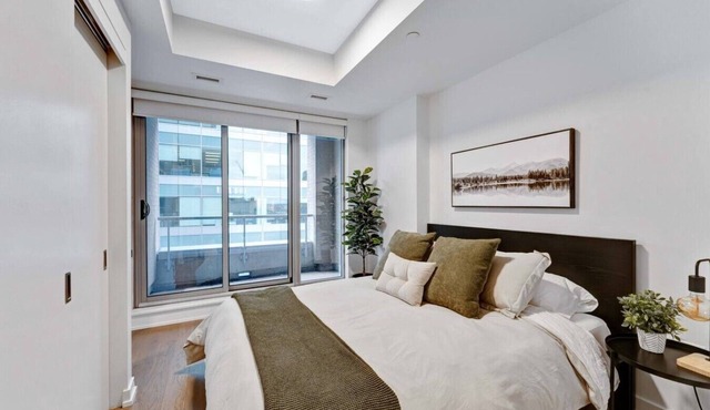 Walk to Parliament from this high-end condo w/gym