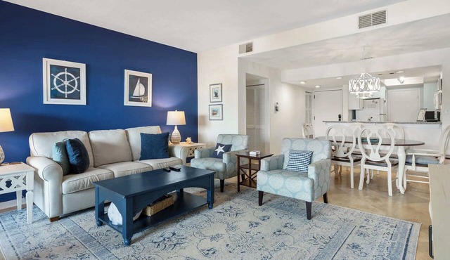 Waterfront condo with walkable locale, central AC, washer dryer, & shared pool