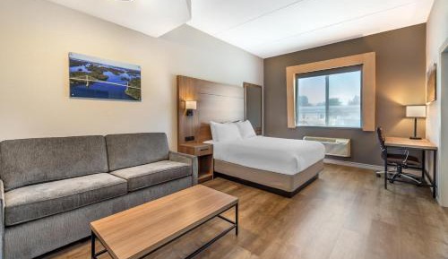 Family Suite with One King, One Queen Bed and Sofa Bed - Fireplace/Non-Smoking