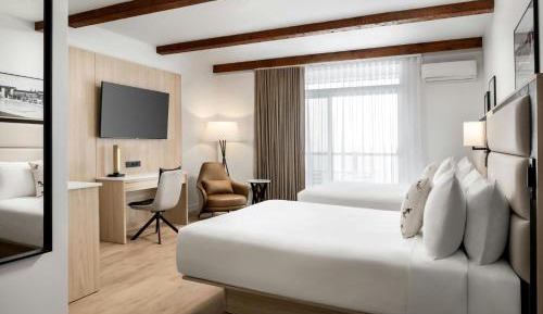 Queen Room with Two Queen Beds and Balcony - Mountain View
