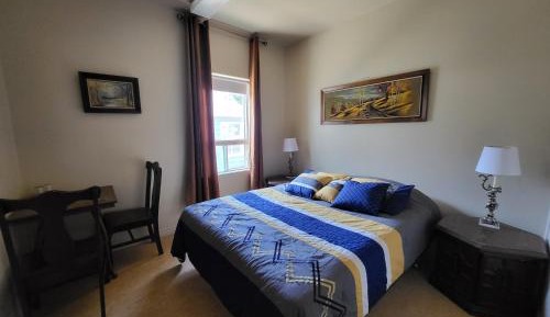Queen Room with Shared Bathroom