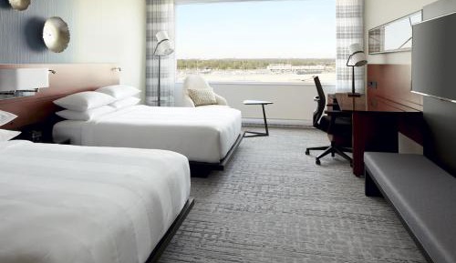 Guest Room with Two Queen Beds and Airport View